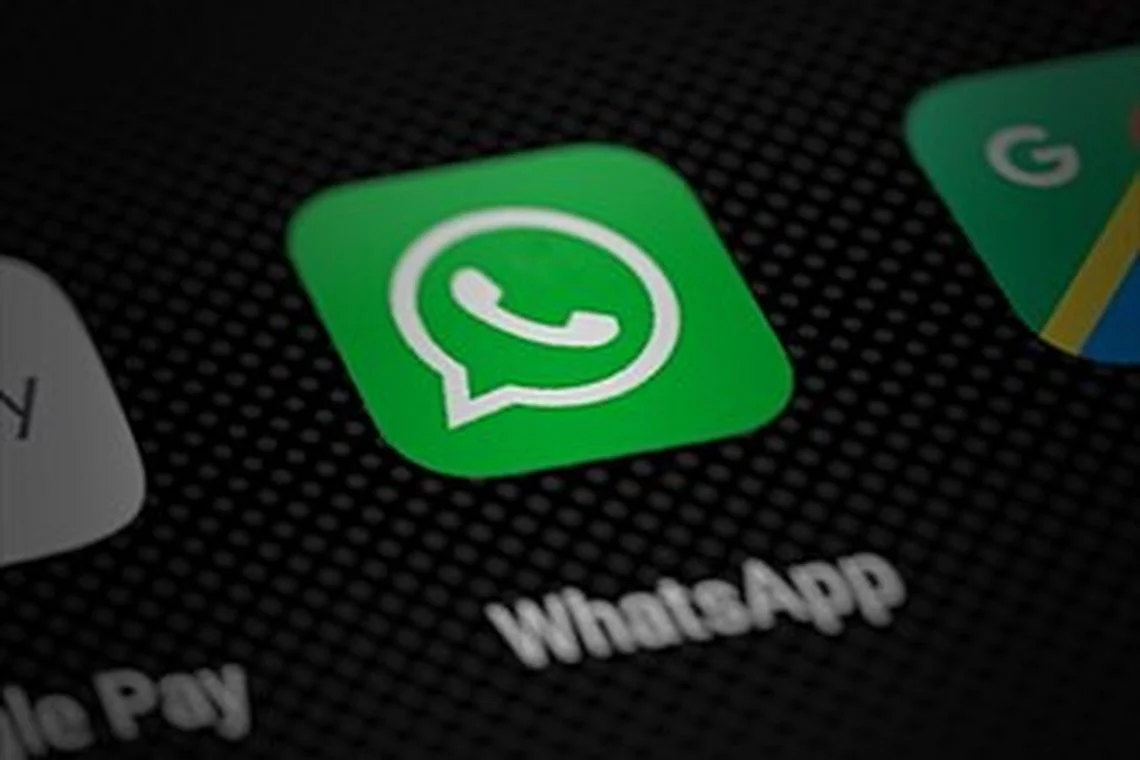 whatsapp_app_icon_on_smartphone_screen_perspective_render_49897226177